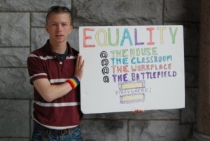 Bradley Manning with Equality Poster Bradley Manning displays a self-made LGBTQ equality poster